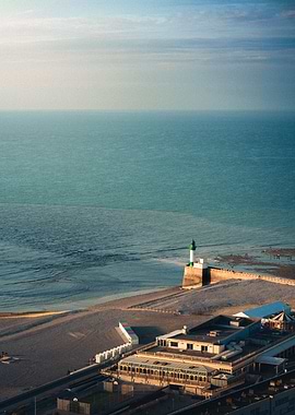 Coastal Lighthouse and Beach View