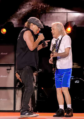 AC/DC performing live on stage