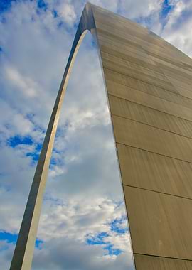 Gateway Arch against a cloudy sky