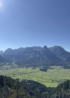 Mountain valley landscape under blue sky
