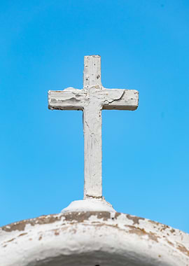 White Cross Against Blue Sky