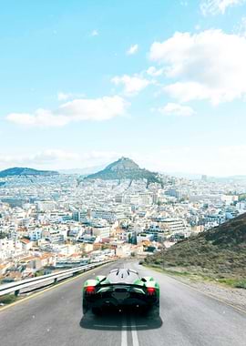 Green Sports Car Driving on Road