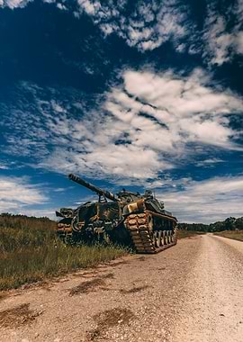 Abandoned Military Tank on a Dirt Road