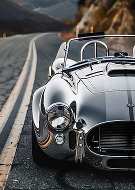 Classic Silver Cobra on Winding Road