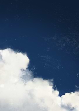 Clouds against a dark blue sky