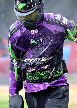 Paintball Player in Action Gear