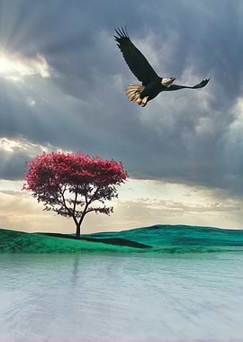 Eagle soaring over landscape with red tree