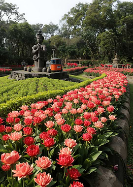 Garden with Flowers and Statue