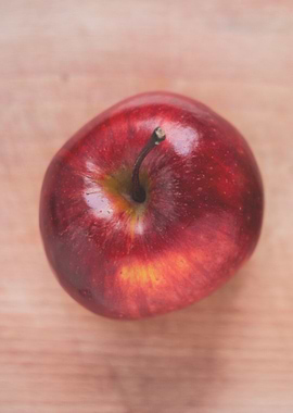 Red Apple on Wooden Surface