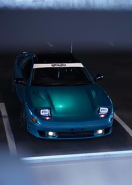 Teal Sports Car in Parking Spot