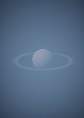 Saturn-like planet with rings in space