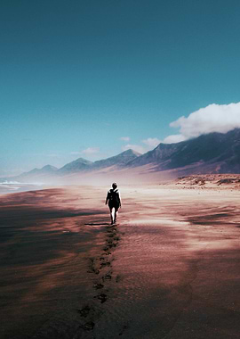 Person walking on a beach