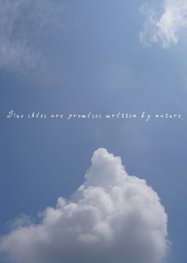 Brilliant white cloud climbing into a clear blue sky, capturing nature’s promise of hope and light.