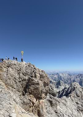 Mountain Peak Zugspitze with Golden Cross and People