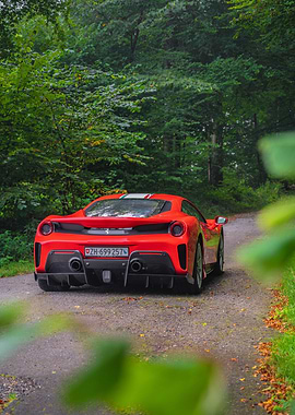 Red Ferrari in Forest Setting