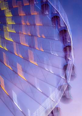 Blurred Ferris Wheel at Night