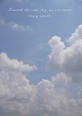 The endless sky holds soft clouds that speak of unity, reminding us we share the same horizon no matter where we are.