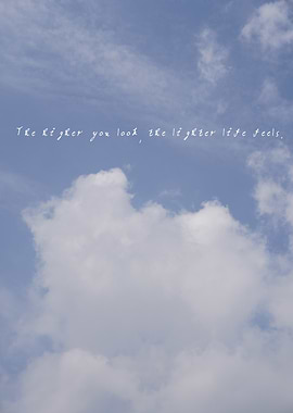 A serene sky with clouds floating freely, evoking the feeling that life grows lighter the higher we look.