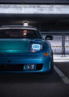 Teal Mitsubishi 3000GT in Parking Garage