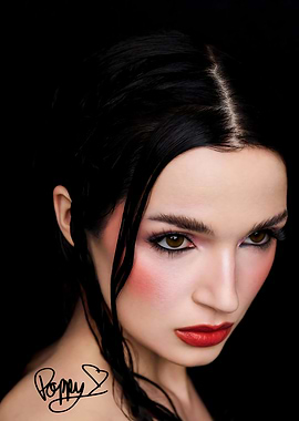 Poppy portrait with signature on shoulder