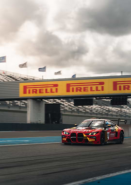 Red BMW Race Car on Track