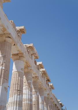 Parthenon Columns Against Blue Sky