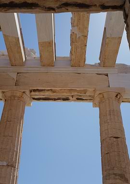 Parthenon Columns Against Blue Sky