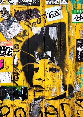 Urban Yellow Wall with Graffiti Portrait