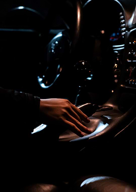Hand on car console at night C5 corvette manual