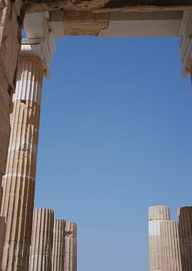 Ancient Columns Framing Blue Sky