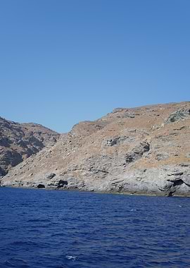 Rocky Coastline with Blue Sea Greece Mykonos