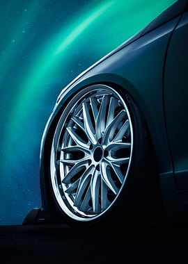Car wheel with aurora background