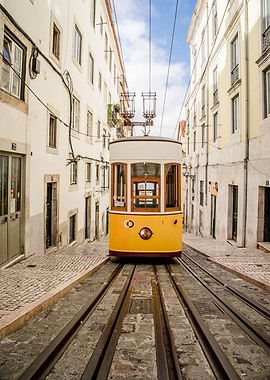 Lisbon Tram Ascending Cobblestone Street