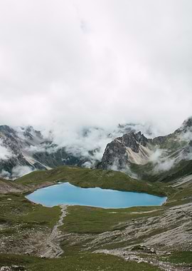 Alpine Lake Surrounded by Mountains