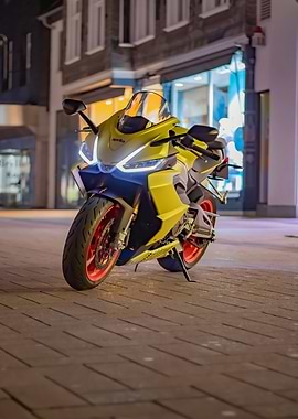 Yellow Aprilia Motorcycle on City Street