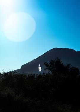 Mountain Silhouette with Bright Sky