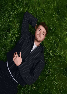 Man in Suit Lying in Grass