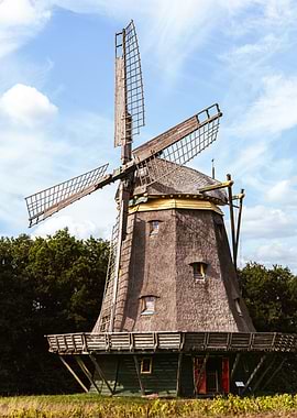 Traditional Windmill Under a Blue Sky