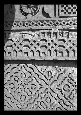 Stone Carvings: Intricate Patterns in Black and White