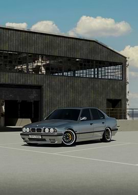 Silver BMW E34 in Urban Setting