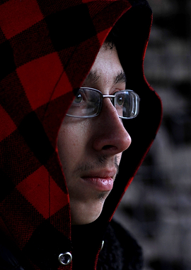 Man in Red and Black Hood