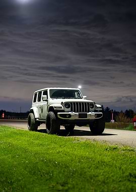 White Jeep Wrangler at Night