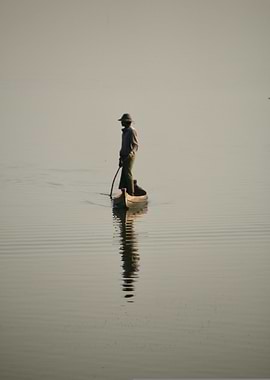 Man in boat on calm water