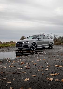 Gray Audi RS3 Sedan on Wet Asphalt