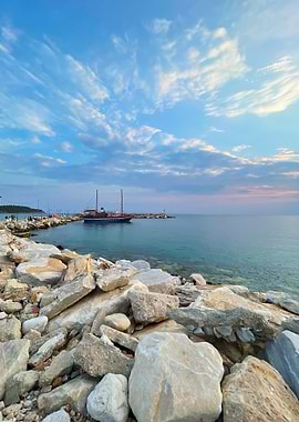 Seascape with Boat and Rocky Shore