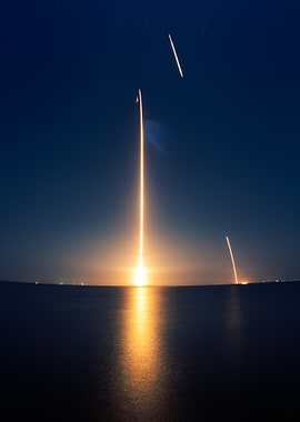 Rocket Launch at Night over Water