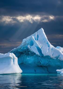Iceberg under dramatic sky