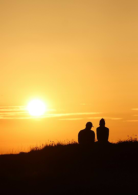 Silhouette of couple at sunset