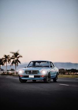 Classic Blue Car on Road