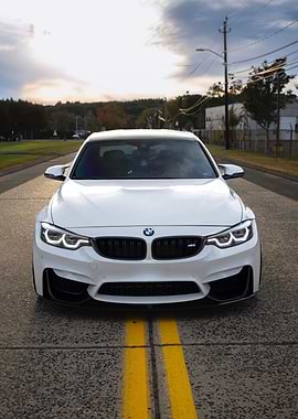White BMW M4 on Road